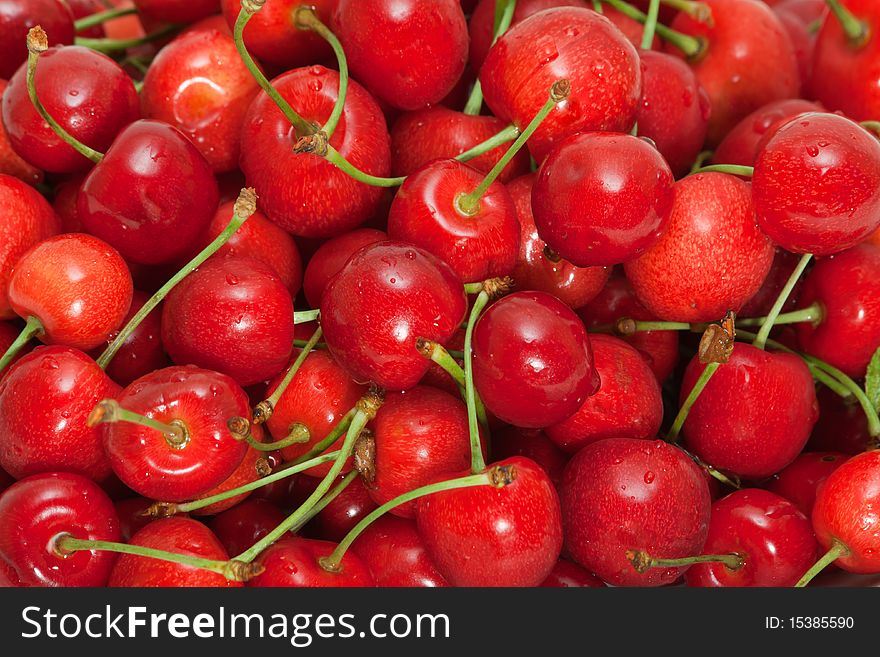 Background sweet ripe cherry close. Background sweet ripe cherry close