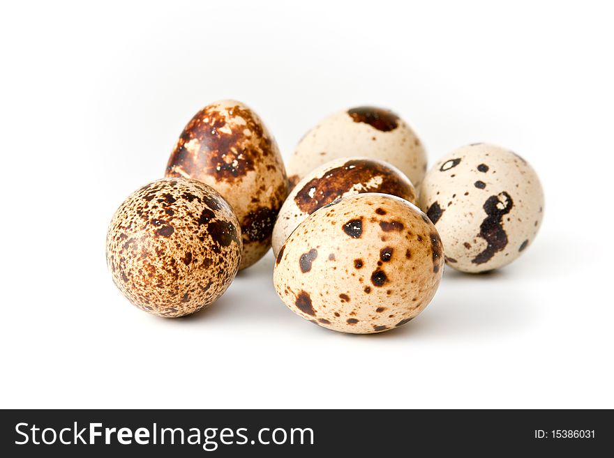 Quail eggs  isolated on white background