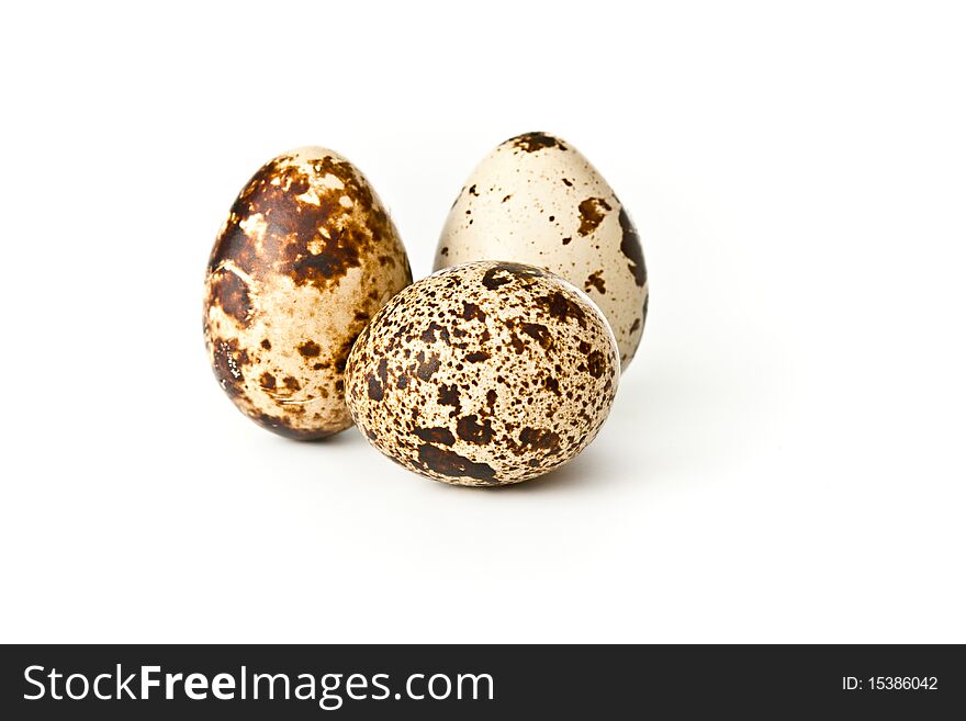 Quail eggs isolated on white background