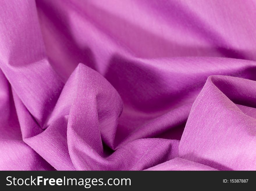 Purple background with waves of curtain