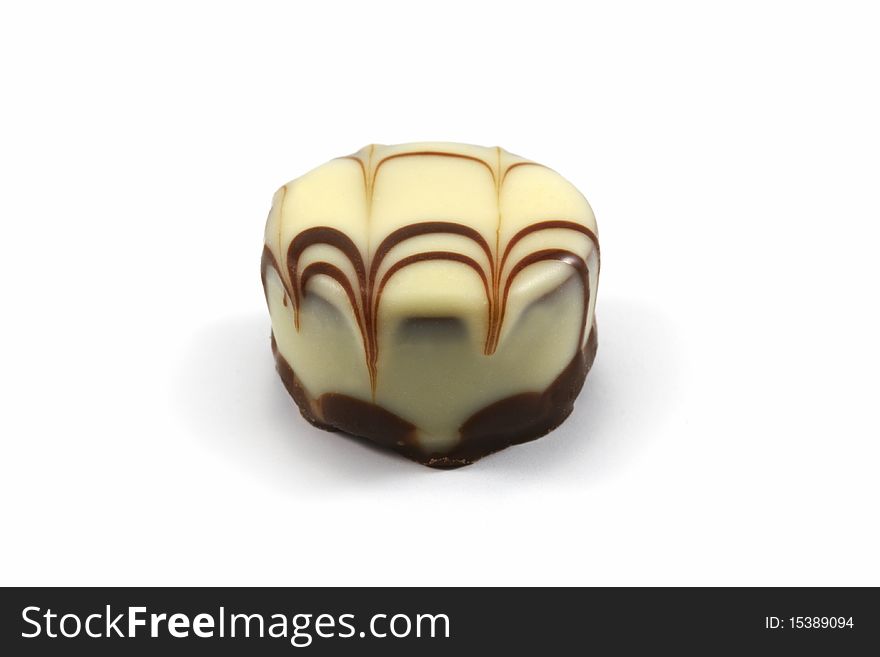 Chocolate praline on white background - Schokoladenpraline vor weissem Hintergrund.