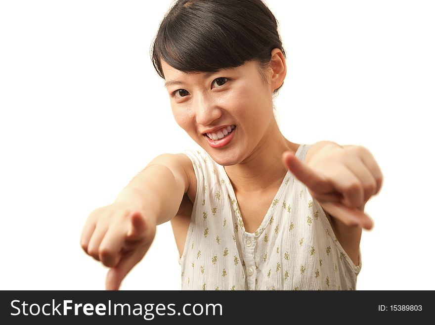 Attractive young woman pointing at you