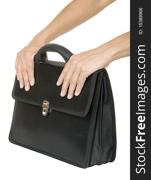 Hand holding a black briefcase on a white background