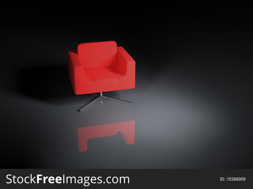 A red armchair on a black background