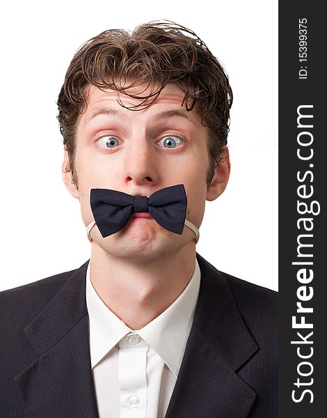 Funny crazy goggle-eyed man with a butterfly tie goggle-eyed on a white background