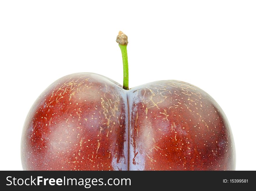 Fresh ripe natural twinned plum isolated on white background. Fresh ripe natural twinned plum isolated on white background