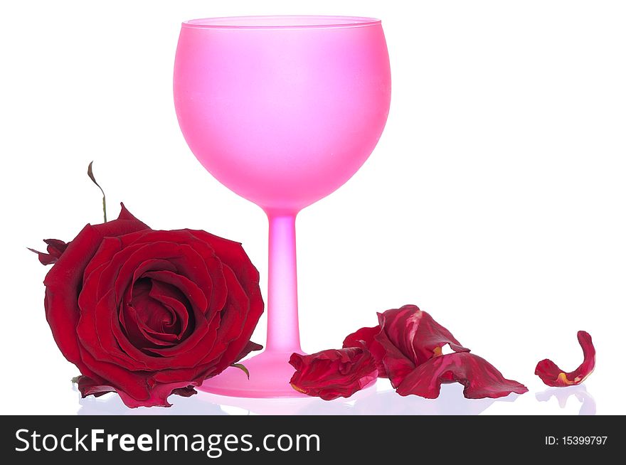 Tumbler with red rose on the party. Tumbler with red rose on the party