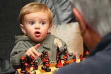 Young Boy Playing Chess Royalty Free Stock Images