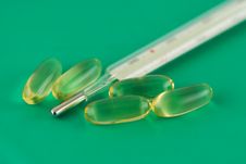 Thermometer And Pills Royalty Free Stock Image Thermometer And Pills Royalty Free Stock Image