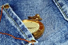 Gold Pocket Watch And Jean Royalty Free Stock Photography
