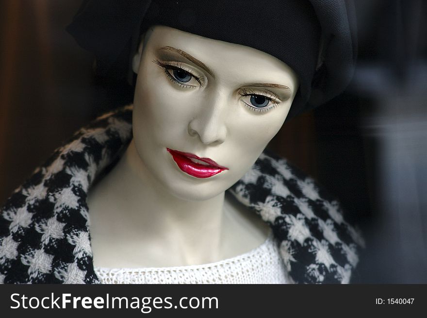 Woman mannequin in shop window