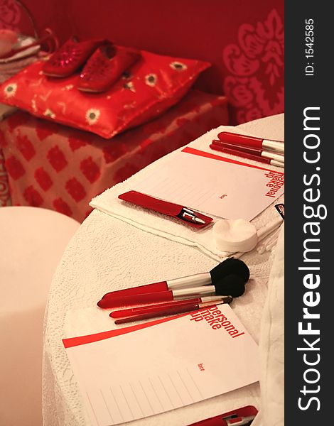 Make-up table for party preparation in red