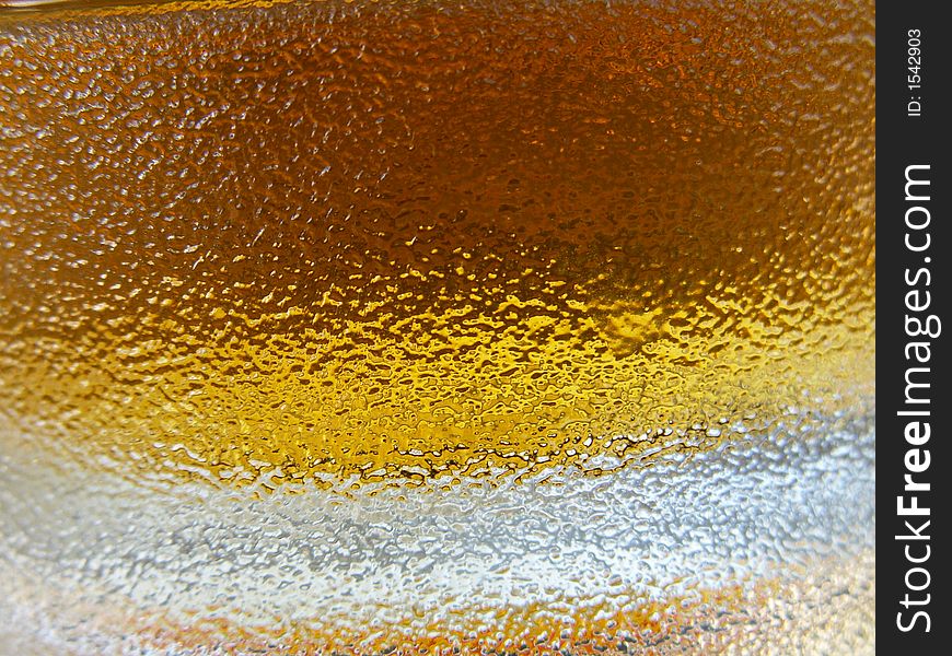 Detail of the glass of beer