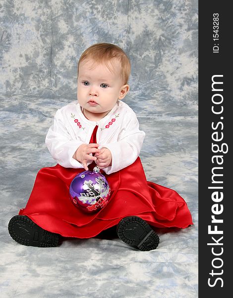 Little Baby Girl in red Christmas dress