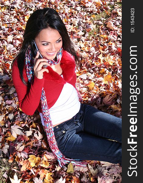 Autumn Scene Fall Woman With Cell Phone
Communications Scene With Eye Appealing Model