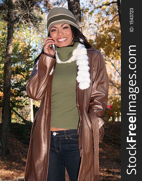 Autumn Scene Fall Woman With Cell Phone
Communications Scene With Eye Appealing Model