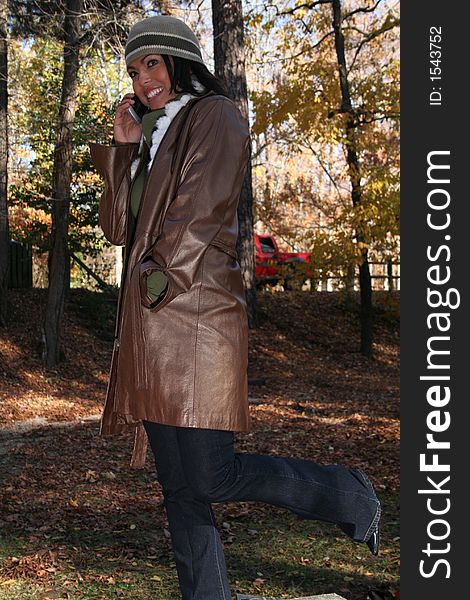 Autumn Scene Fall Woman With Cell Phone
Communications Scene With Eye Appealing Model