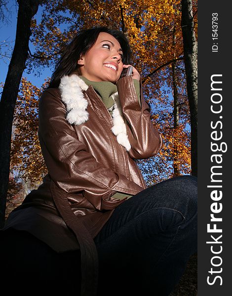 Autumn Scene Fall Woman With Cell Phone
Communications Scene With Eye Appealing Model