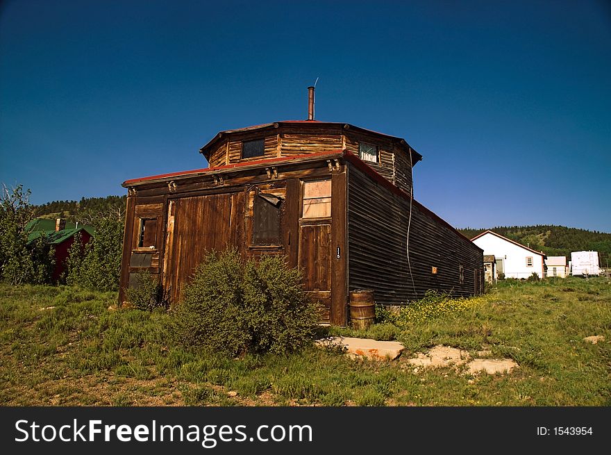 Old Wooden Cabin Building in a ghost town. Old Wooden Cabin Building in a ghost town