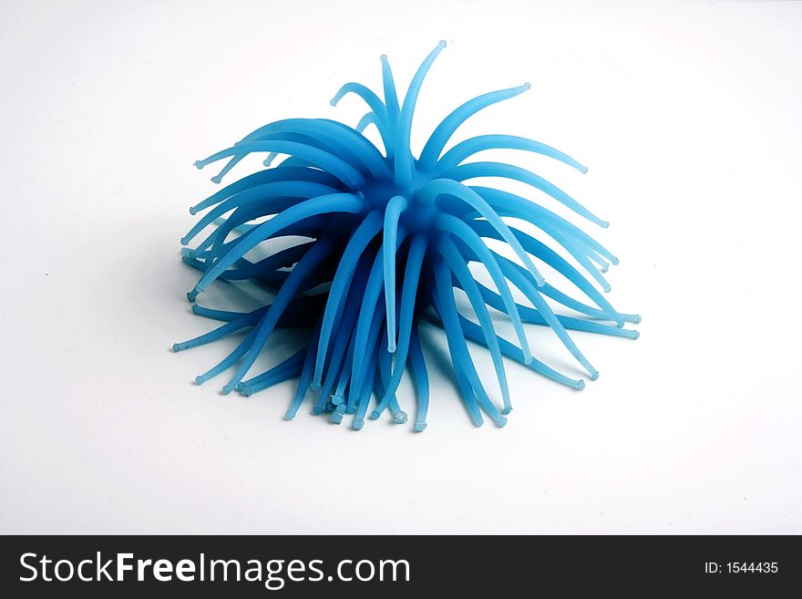 Rubber ball on white slight shadow  used to help children with adhd study. Rubber ball on white slight shadow  used to help children with adhd study