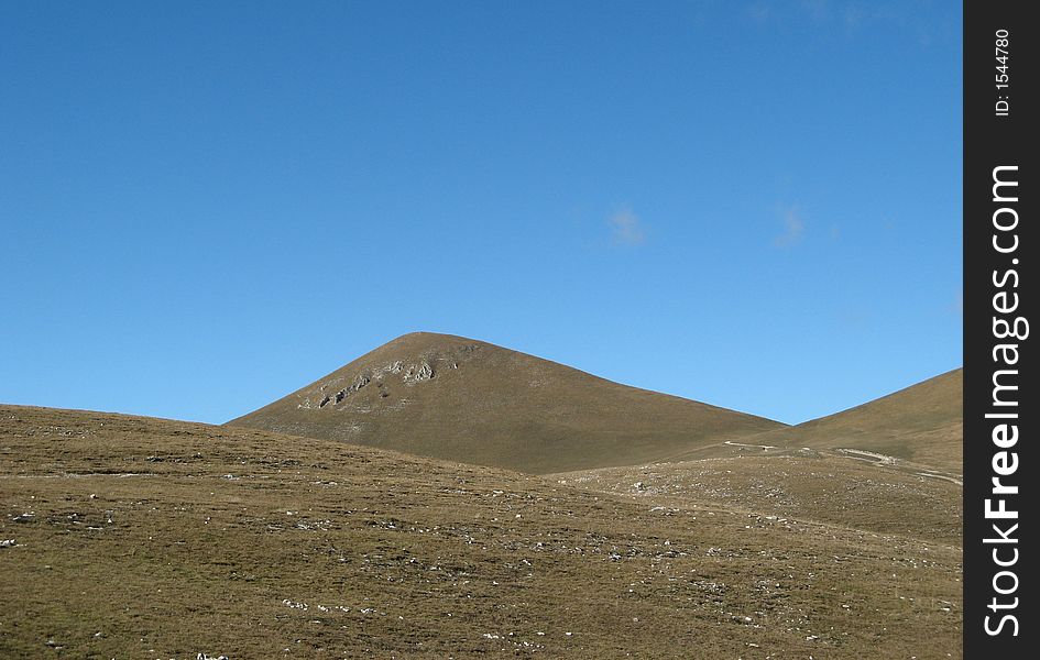 desert hills with blue sky