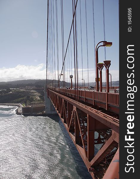 Part of the Golden Gate Bridge with San Francisco in background