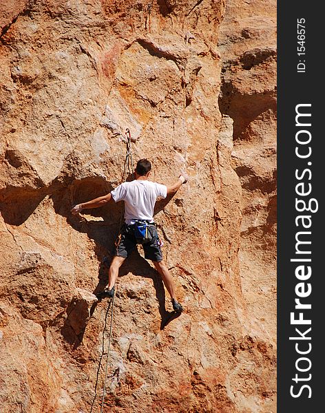 Climbing in a volcanic area in tenerife, spain. Shot in the afternoon. Climbing in a volcanic area in tenerife, spain. Shot in the afternoon.