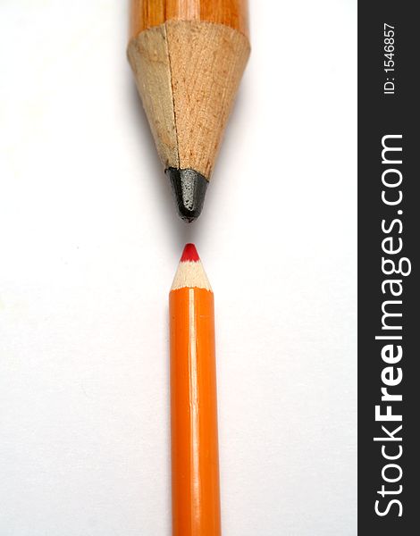 Opposition of a small and greater pencil on a vertical