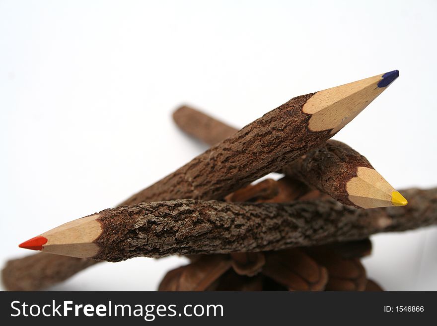 Heap Of Pencils Made Of A Natural Tree On A Piny Cone