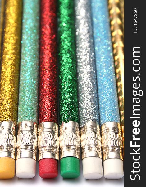 Set Of Celebratory Brilliant Pencils Laying In Parallel