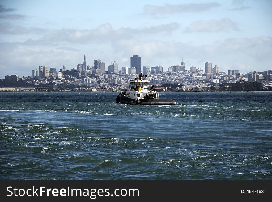 Skyline of San Farncisco - tugboat in front, California, USA. Skyline of San Farncisco - tugboat in front, California, USA