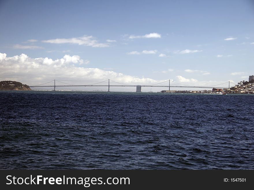 Bay Bridge with Treasure Island from seaside in San Francisco, USA. Bay Bridge with Treasure Island from seaside in San Francisco, USA