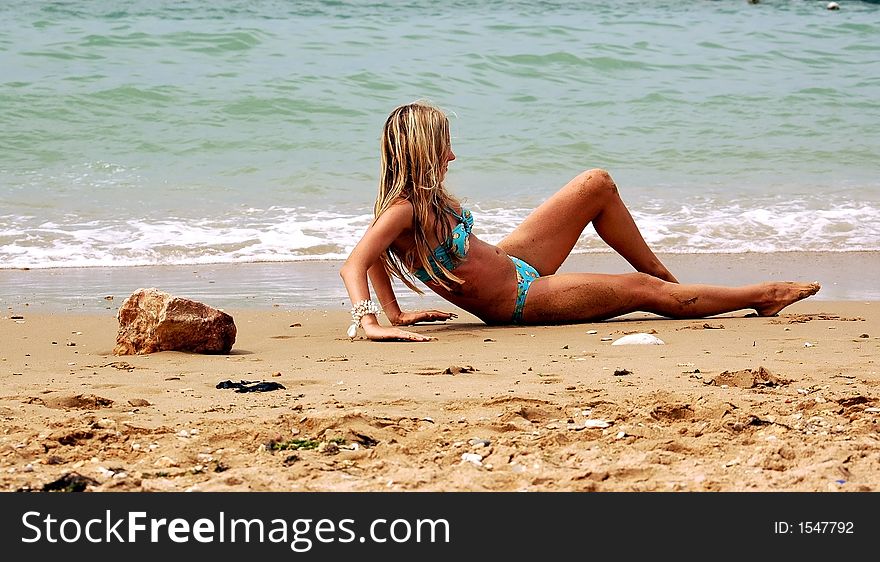 Girl on the sea beach