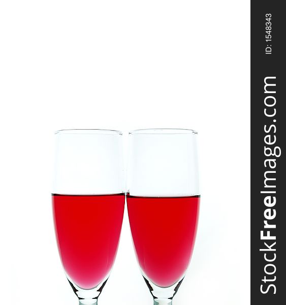 Red wine over white background