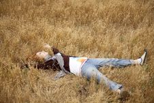 Young Beautiful Girl Lying At Yellow Autumn Field. Stock Photography Young Beautiful Girl Lying At Yellow Autumn Field. Stock Photography