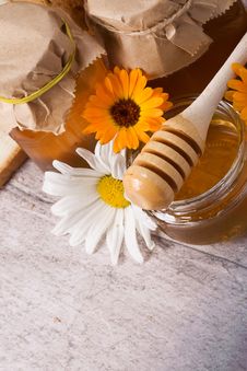 Flowers And Honey On Table Stock Image Flowers And Honey On Table Stock Image