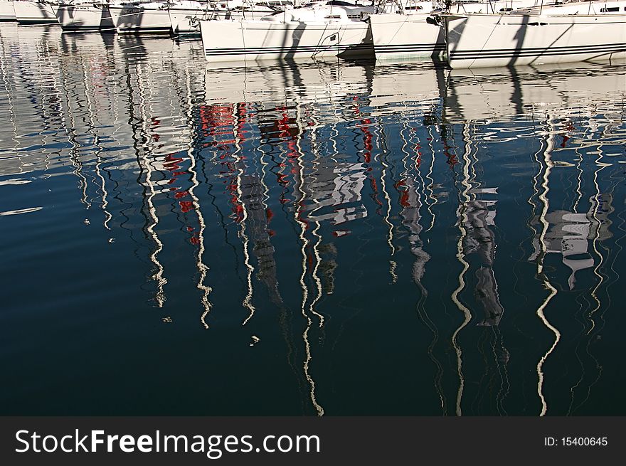 Yachts In Marina And Reflections