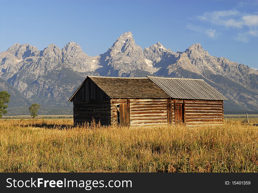 Barn in wyoming with mountains. Barn in wyoming with mountains