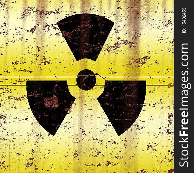 Section of a yellow radioactive barrel compromised by rust. Section of a yellow radioactive barrel compromised by rust