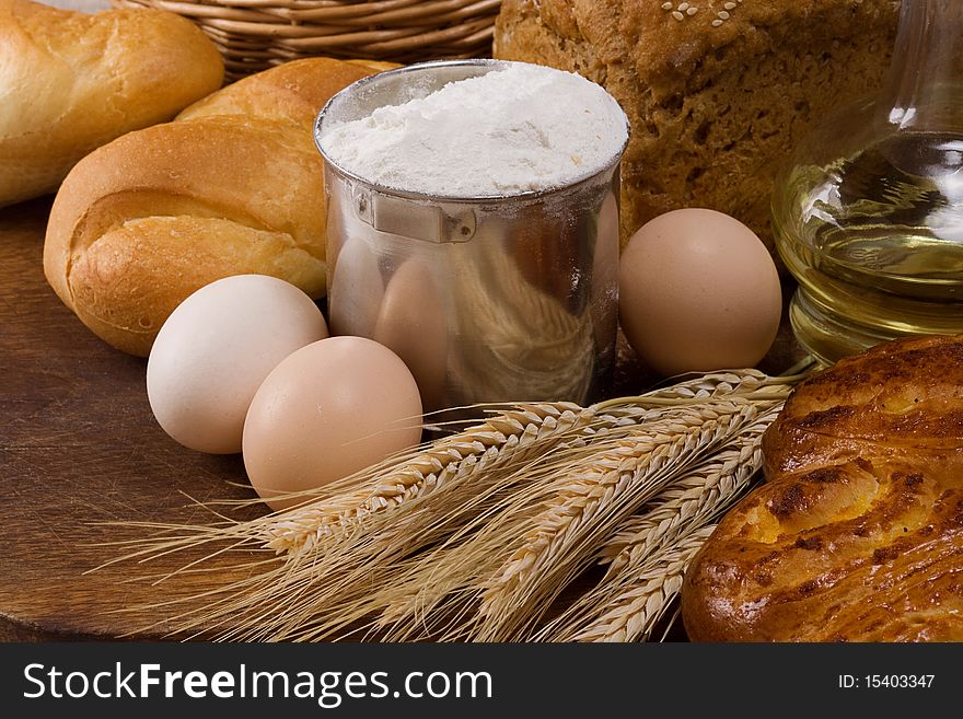 Set of bakery products on wood board