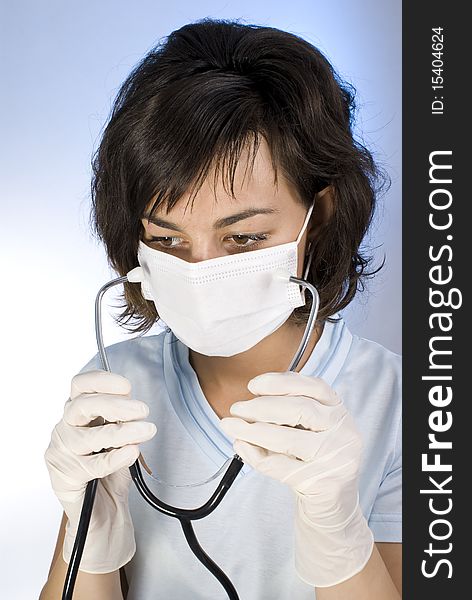 Doctor with stethoscope. Isolated over white background