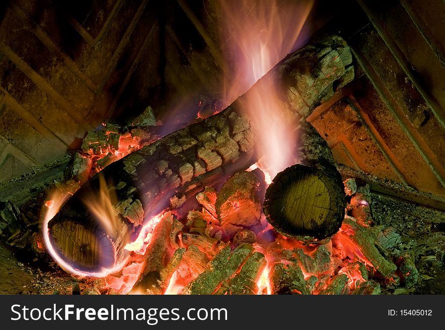 Flames
dry wood burning in a fireplace