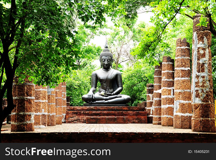 Buddha statue in the ruins of the Siam Cultural Park. Buddha statue in the ruins of the Siam Cultural Park