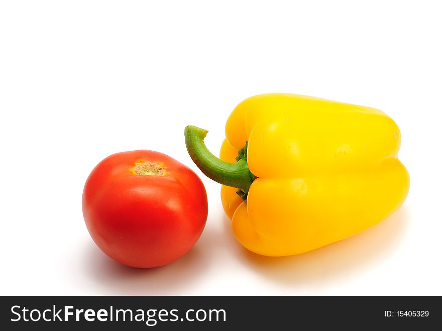 Bulgarian pepper and tomato  on a white background