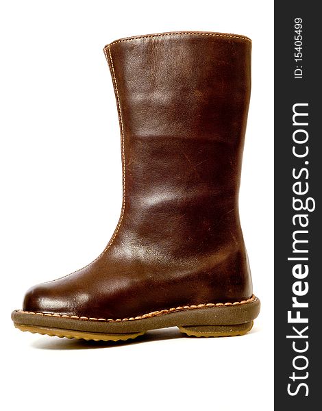 A brown high boot. Taken on a white background.