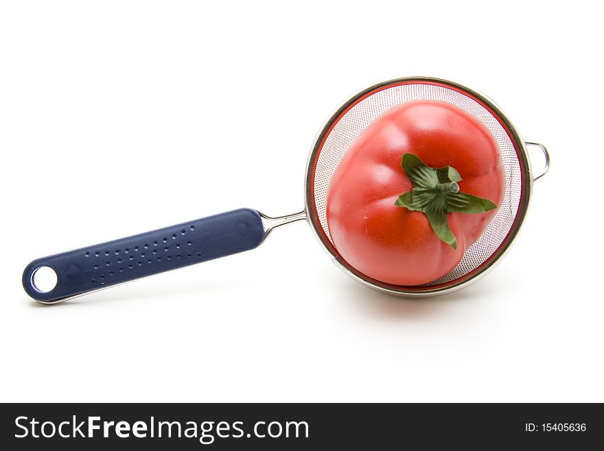 Sieve with tomato