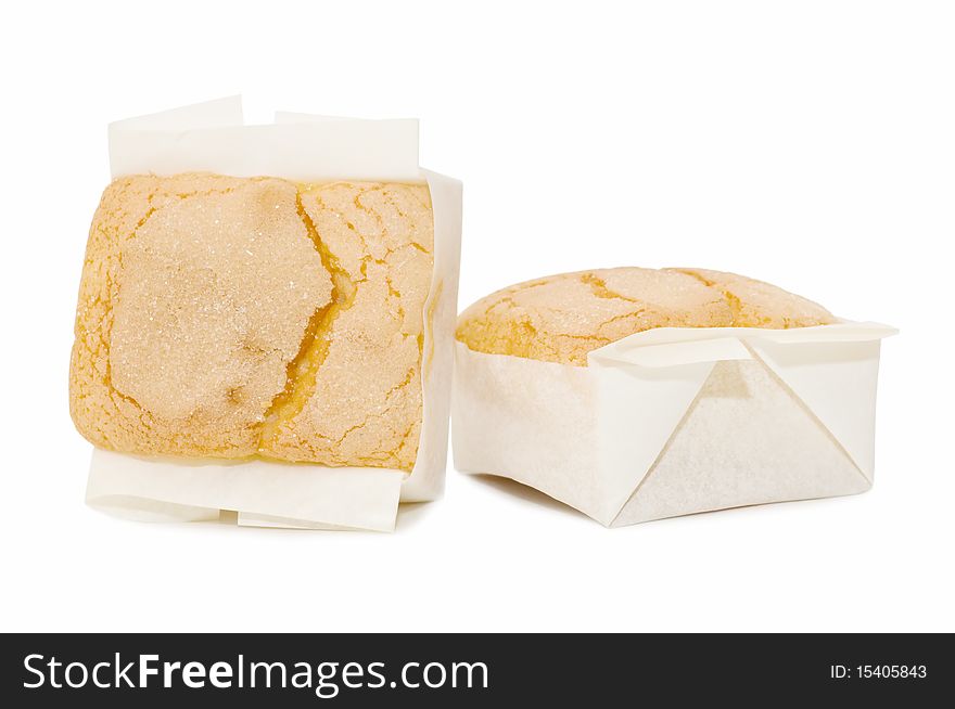 Freshly baked muffins isolated on white background