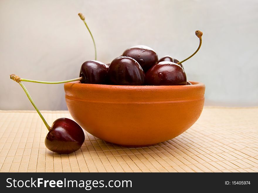 Juicy cherry in the bowl