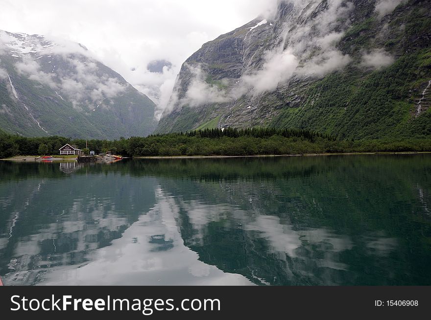 Reflections in Lovatnet lake, Norway