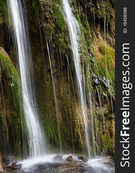 Waterfall on a spring in forest